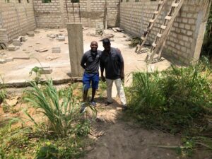 Mr. Appiah & Mr. Dompreh at the site